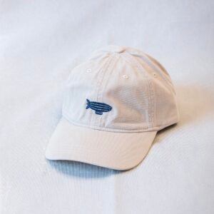 Gorra Rising Dreams Origin blanca acid wash con zeppelin bordado y coordenadas de Málaga