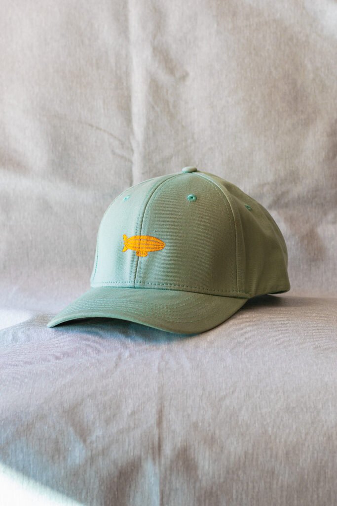 Gorra Rising Dreams Horizon verde con zeppelin Rising Dreams bordado